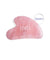 Gua Sha stone in ium rose quartz on white background