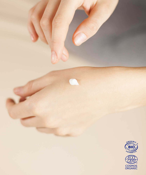 energizing eye balm texture on woman's hand