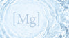Eau bleu ciel avec des vaguelettes et symbole du Magnésium [Mg]