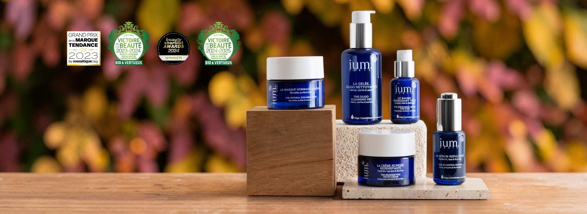 Gamme de cinq soins visage bio IUM Paris aux oligo-éléments dans un décor d’automne